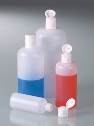 Round bottles with snap closure filled