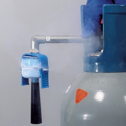Opening the valve, CO2 gas solidifies into dry ice